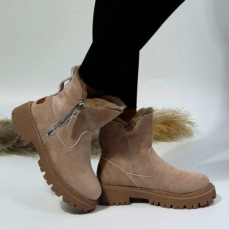 Women's black faux suede high-top snow boots with thick plush lining and a side zipper