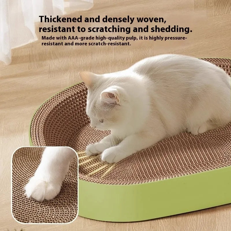 Green oval cat scratch board with integrated nest measuring 55cm in diameter