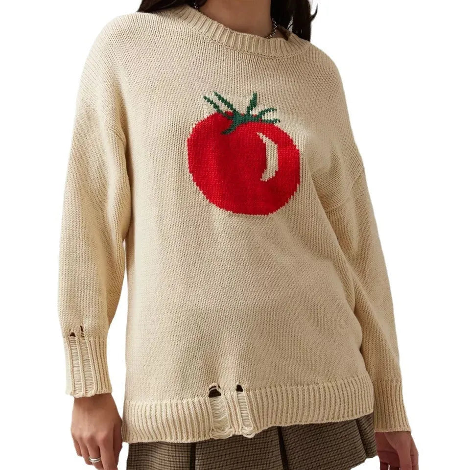 Women's milky white acrylic round neck sweater with jacquard long sleeves, laid flat.