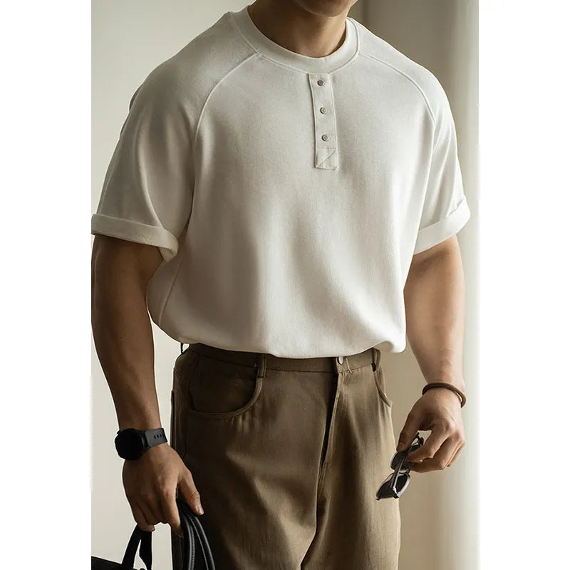 Women's loose-fitting casual pullover top with raglan sleeves in a terry texture fabric.