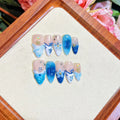 Blue hand-painted carved summer ice transparent plastic fake nails set in sizes XS, S, M, L
