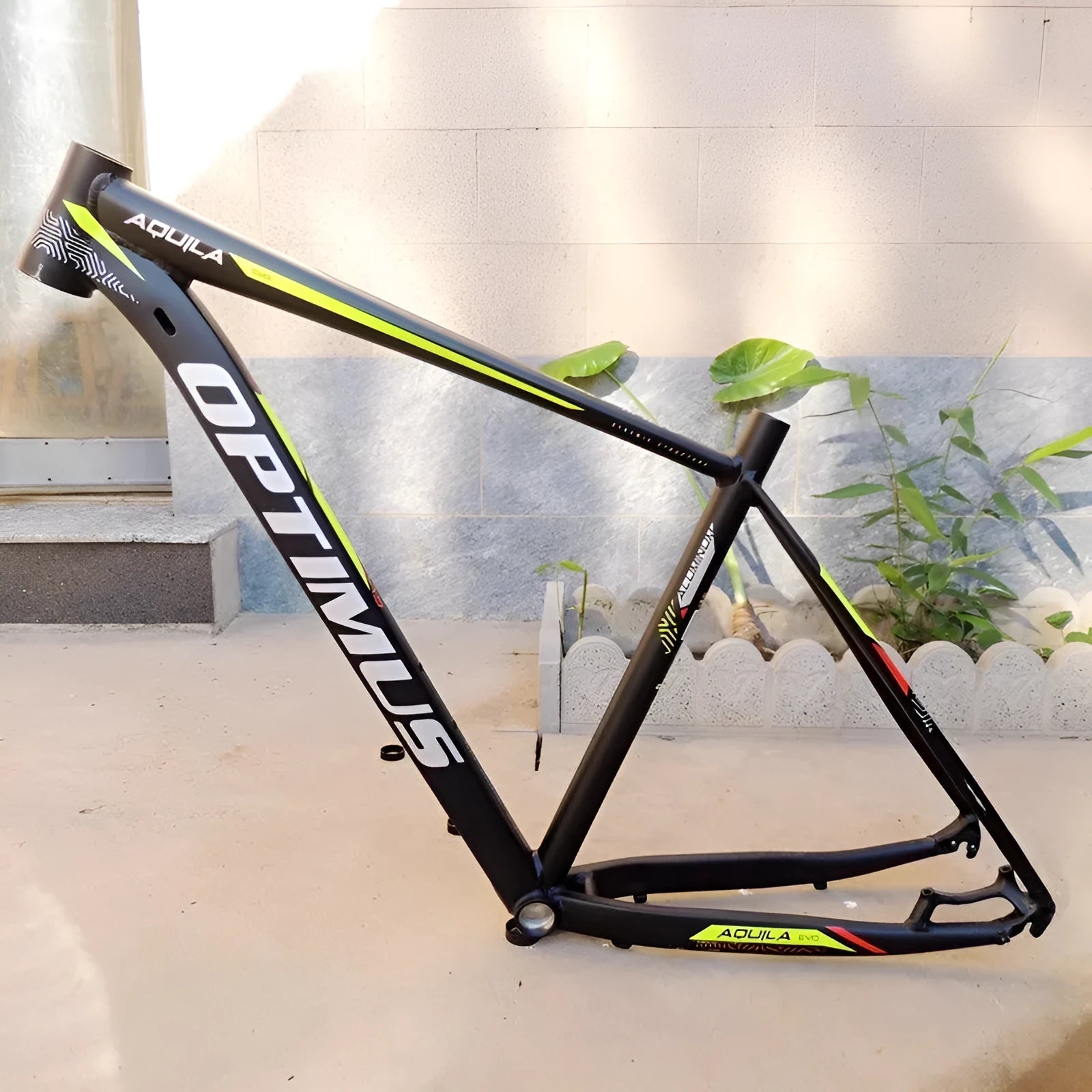 29-inch black green aluminium mountain bike frame with disc brake mounts and inner cable routing