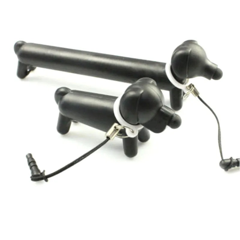 Black dog-shaped touch screen stylus with conductive silicone body on white background