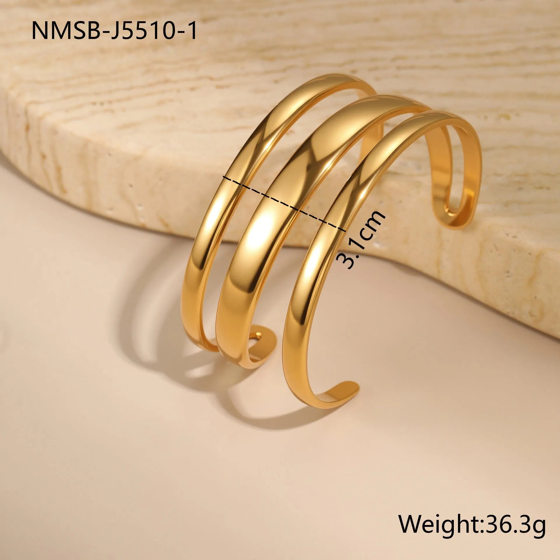 Women's stainless steel bracelet with geometric line design, shown in gold and steel finish options.