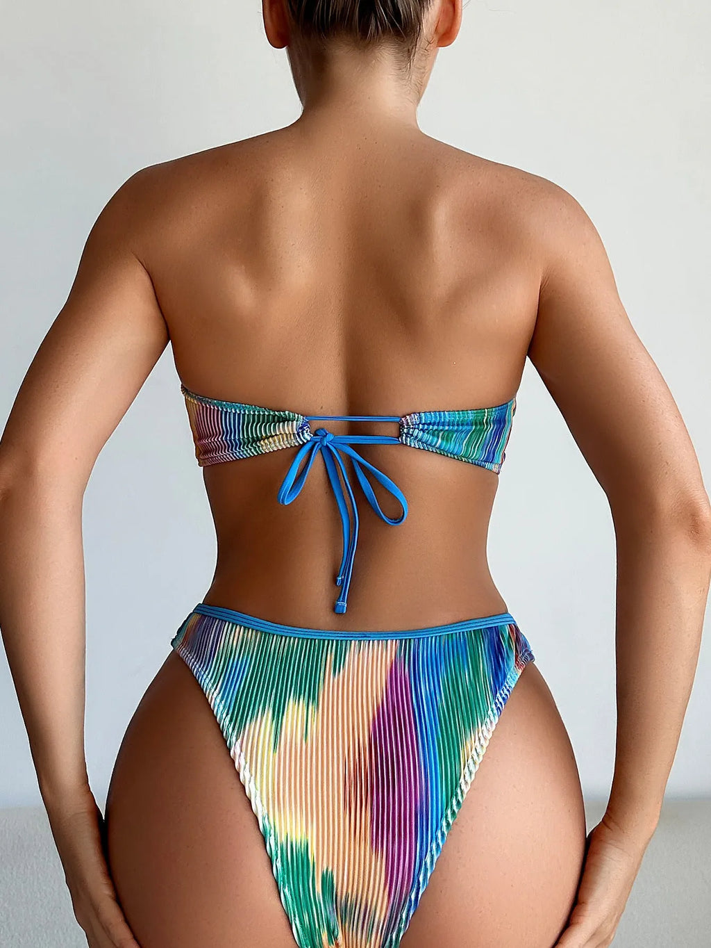 Colour printed tube top bikini two-piece swimsuit set on a mannequin.
