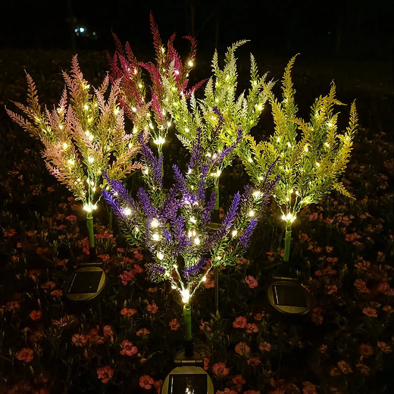 74cm tall solar-powered LED garden light with flower shape and stainless steel stem in a lavender colour
