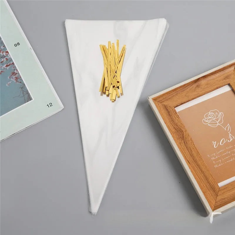 Clear triangle-shaped plastic packaging bag with a silver tie wire closure, shown in a pack of multiple bags.