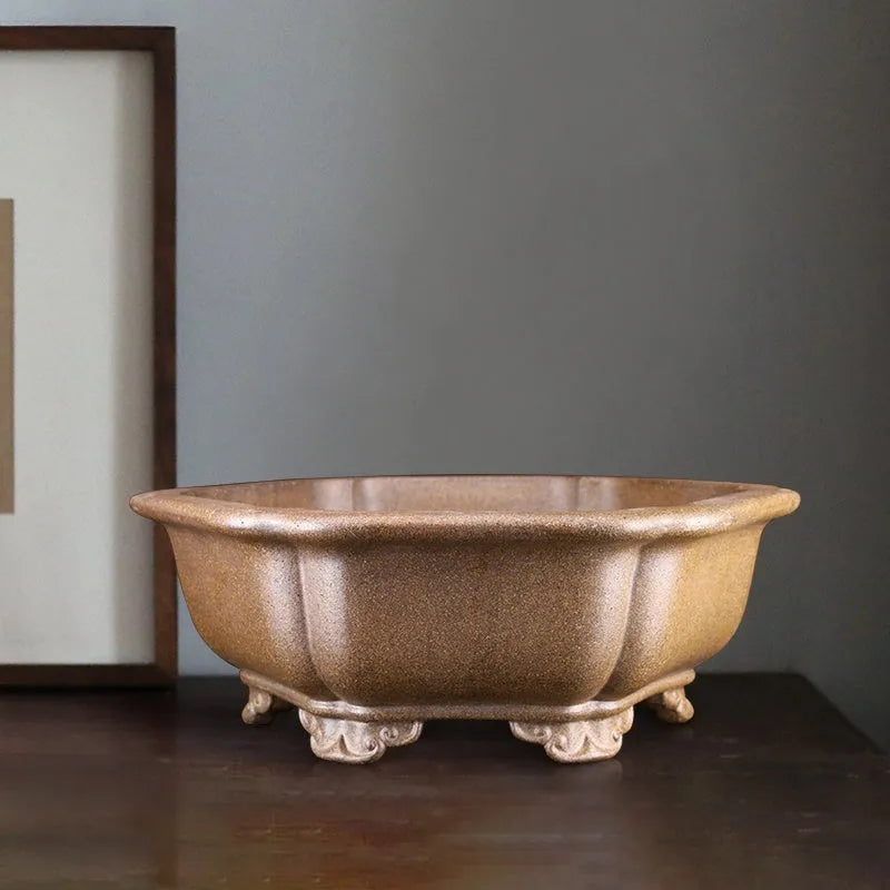 Handmade tea-coloured purple sand flower pot in a large hexagonal or begonia basin shape.