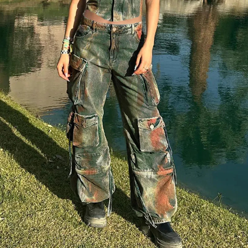 Loose-fit blue denim cargo trousers with multiple front pockets showing gradient colour details