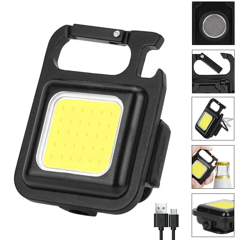 Black aluminium alloy USB rechargeable keychain light with LED, magnet, and folding handle