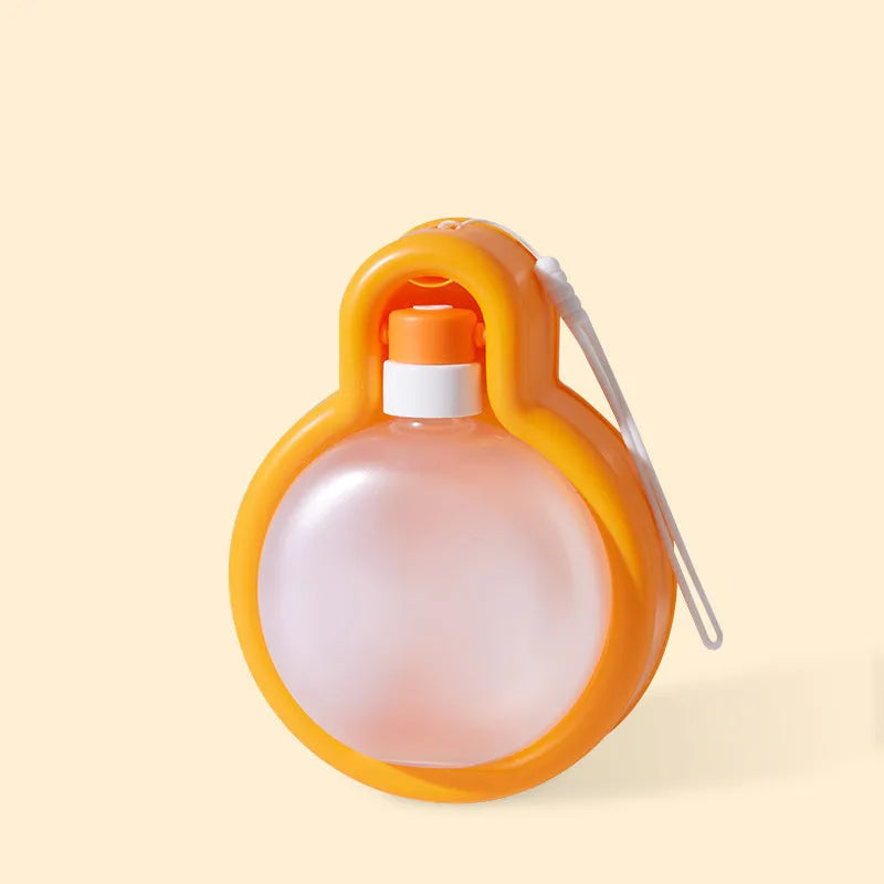 Green portable dog water bottle with pull-out bowl, shown next to orange and yellow versions.