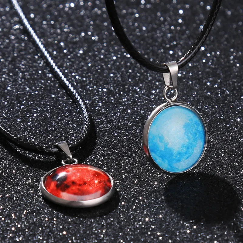 Luminous alloy necklace with a glass constellation pendant on an adjustable chain.