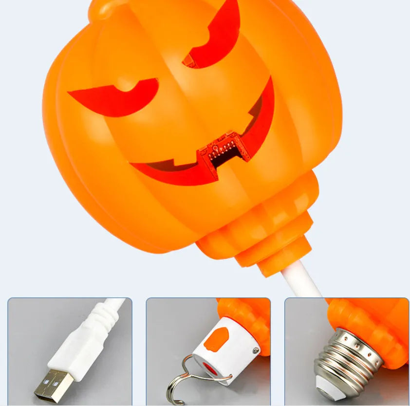 Plastic pumpkin lamp with USB port showing yellow and purple light options