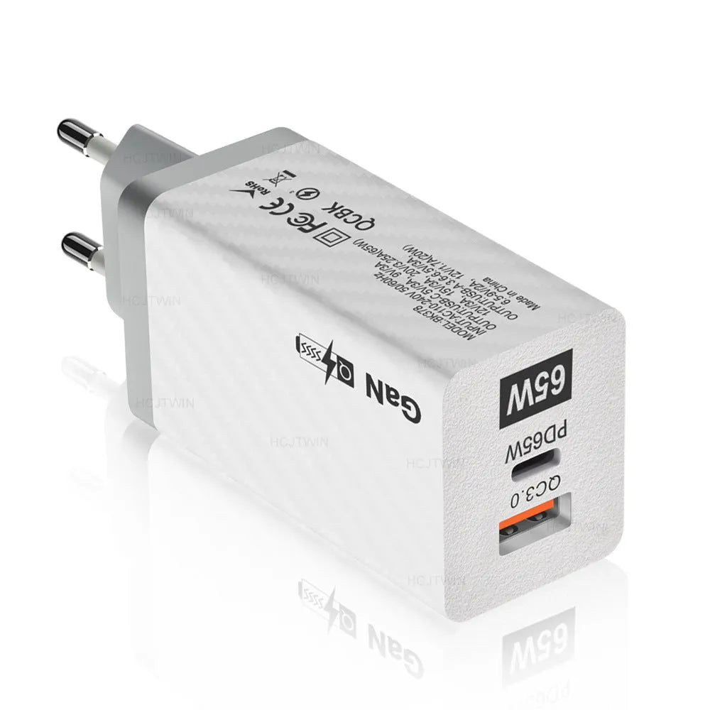 Gallium Nitride 65W laptop charger in black or white with compact dimensions and multiple electrical plug options