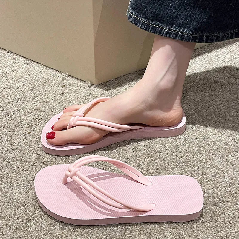 Men's casual flip flops with toe covering in PVC material, showing non-slip sole pattern and full foot enclosure design