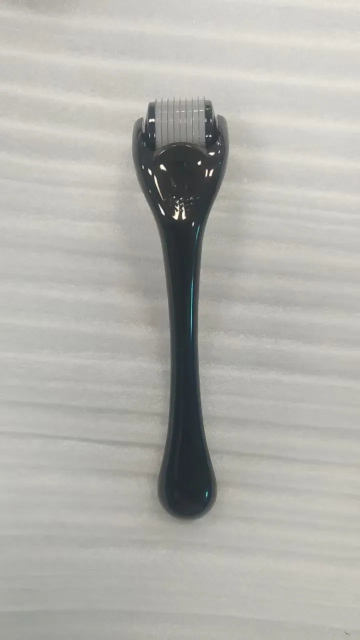 Professional 540 needle dermaroller for mechanical font with coloured handle and wheel, showing sterile stainless steel needles.