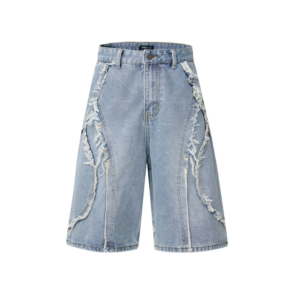 Distressed raw edge denim shorts in light blue, straight leg cropped cut.