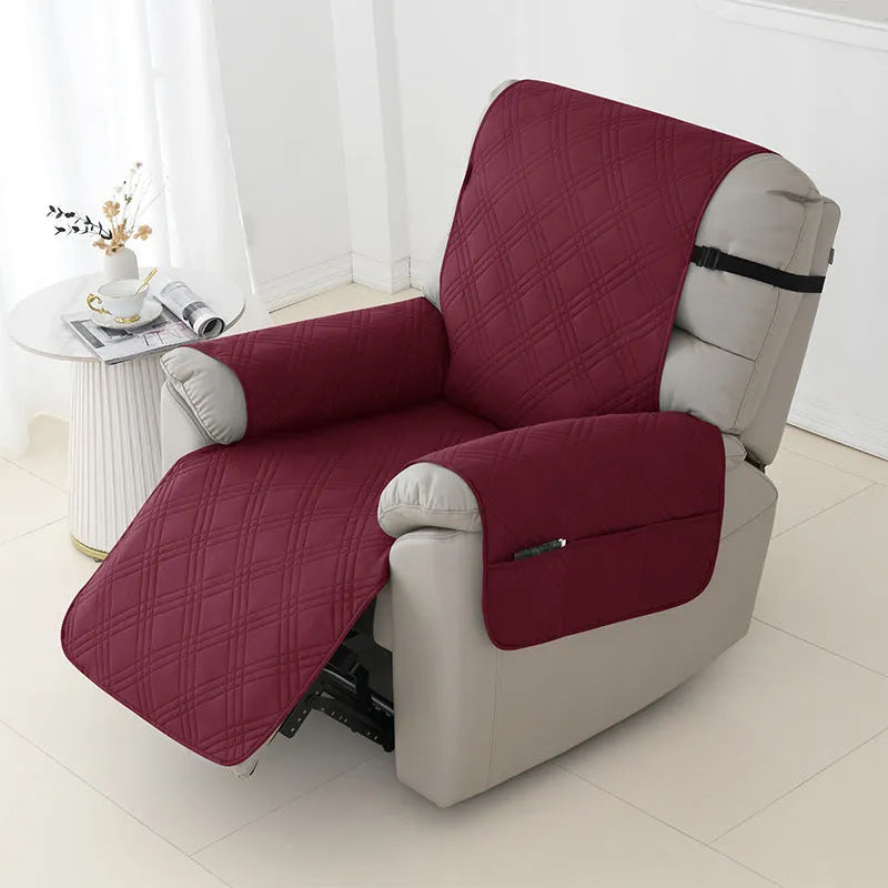 Quilted waterproof sofa cover in burgundy on a Chivas massage chair, showing three-line stitching and fitted design.