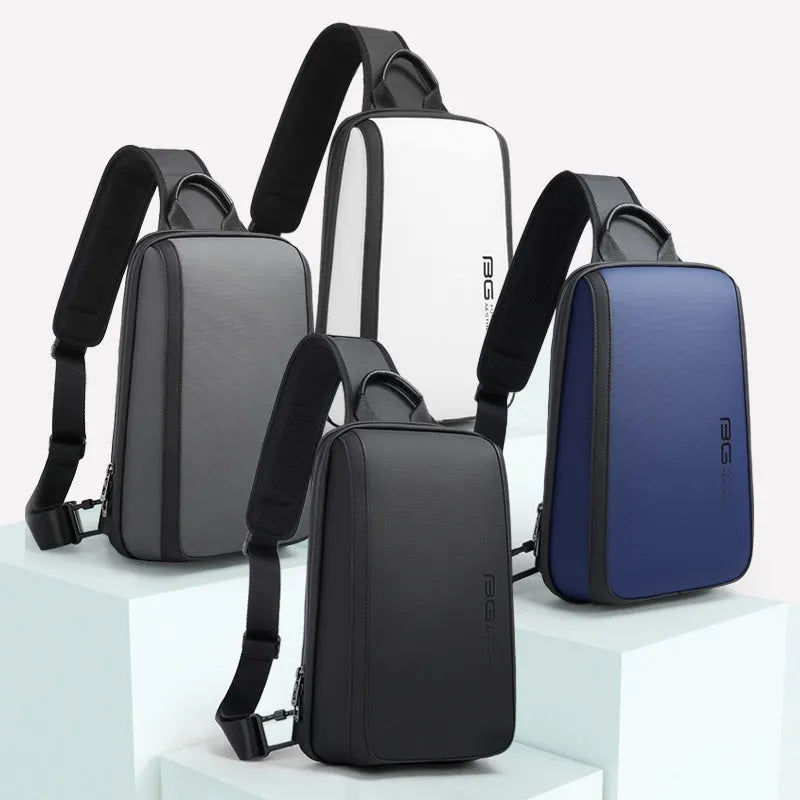 Blue oxford cloth chest bag for men with shoulder straps, showing front pocket and handle.