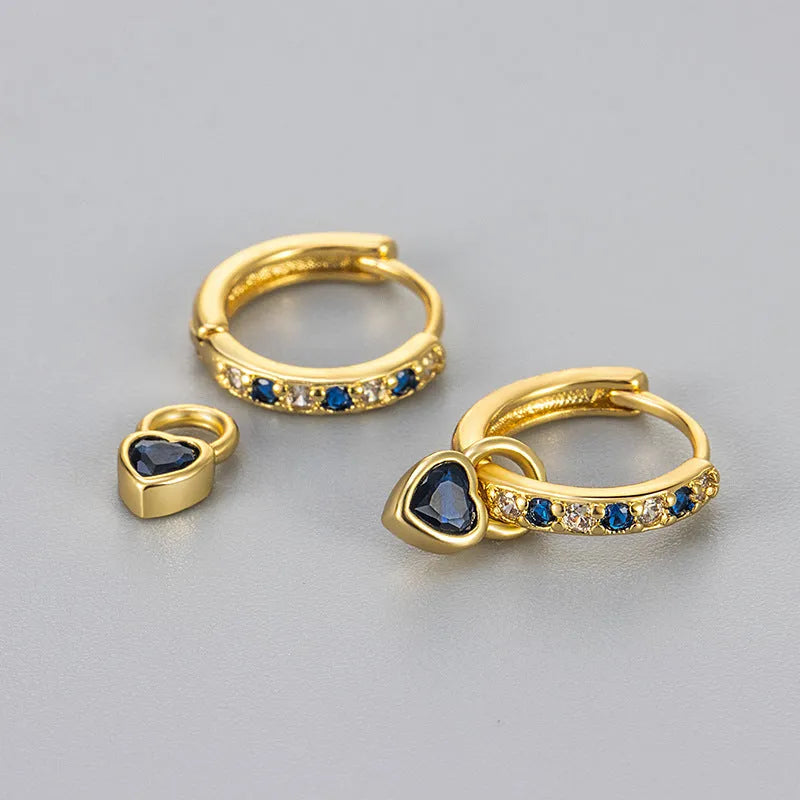 Women's fashion earrings with heart-shaped zircon eardrops in gold and white gold coloured settings