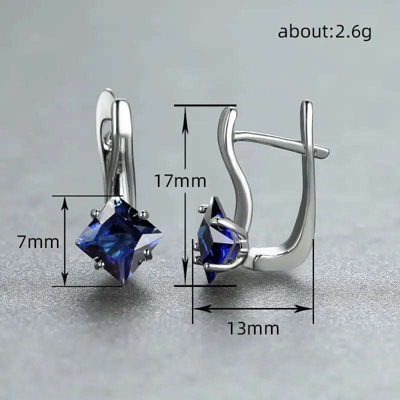 Copper diamond-shaped earrings for women with inlaid zircon stones in blue, green, and colour variants.