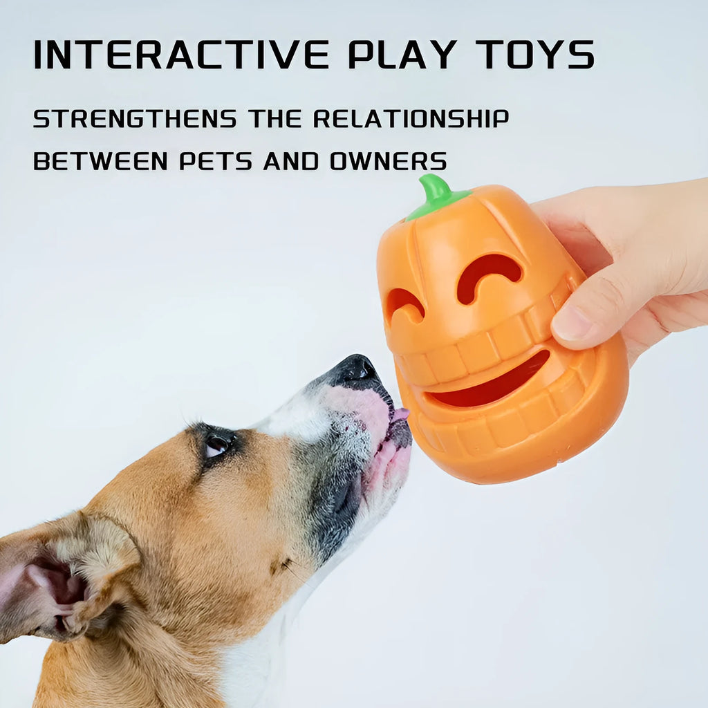 Orange Halloween pumpkin shaped dog chew toy with treat-dispensing funnel opening