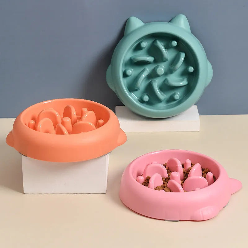 Green bone maze slow feeder dog bowl made of PP plastic for anti gulping and choking.