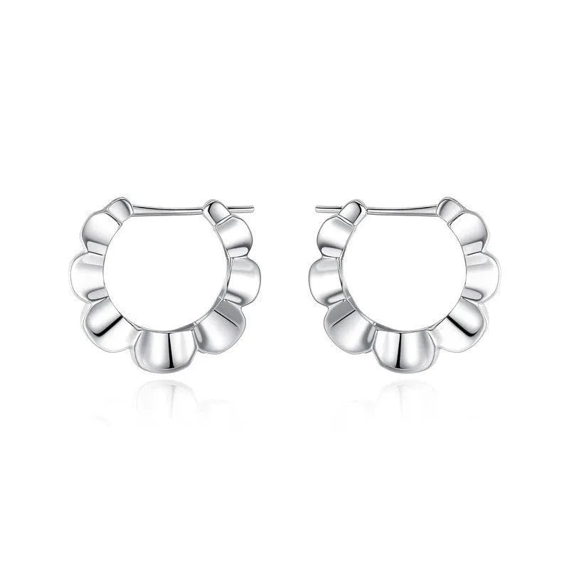Sterling silver geometric earrings with circular elements and retro design