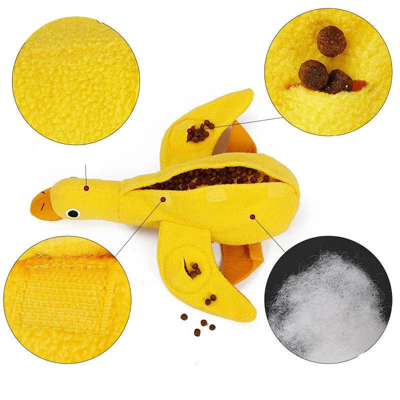 Yellow dog training toy with duck sound module and central treat dispenser slot