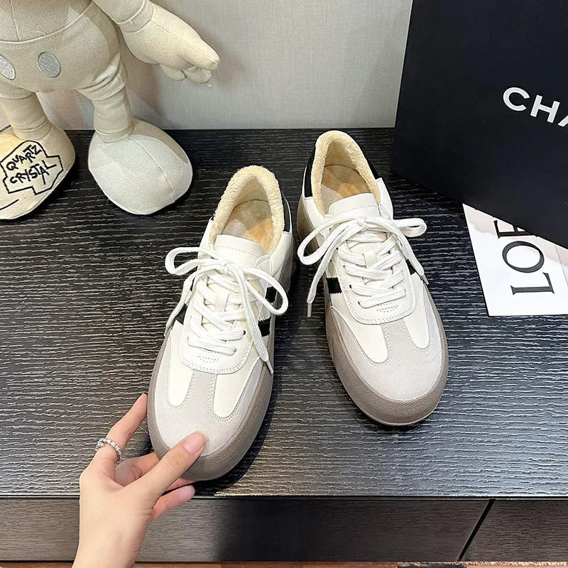 Women's vintage distressed leather sneakers with round toe and front lace-up design