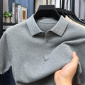 Men's loose fit grey cotton short sleeve pullover sweater on a hanger