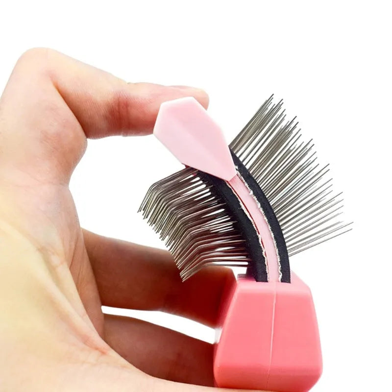 Blue double-sided pet brush showing stainless steel pins on one side and firm bristles on the other.