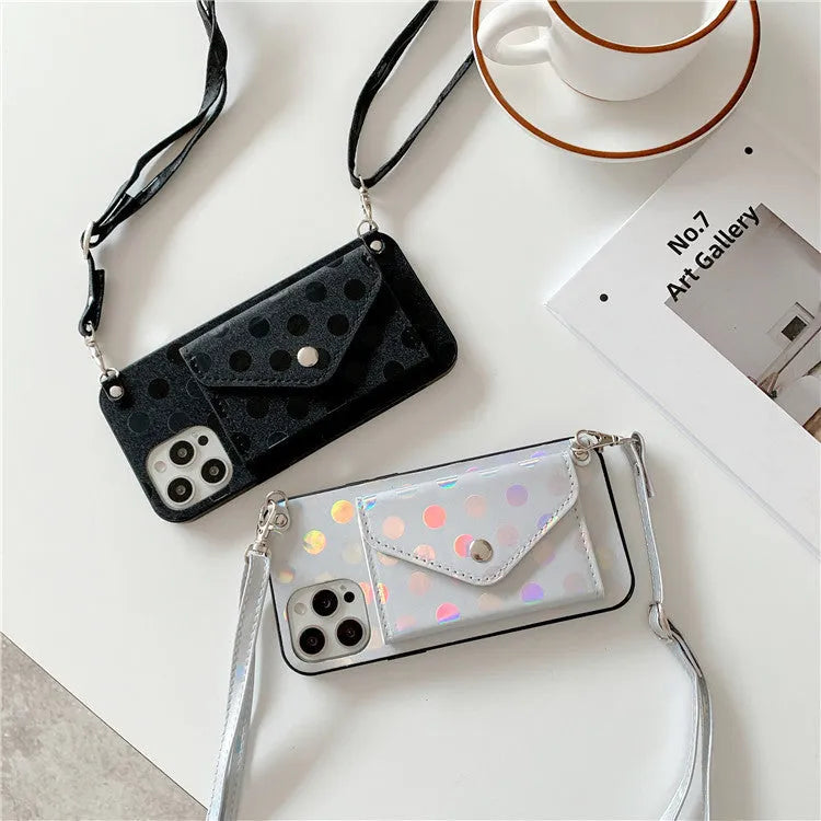 Black silicone iPhone case with a diagonal card slot and raised wave point pattern on the back.