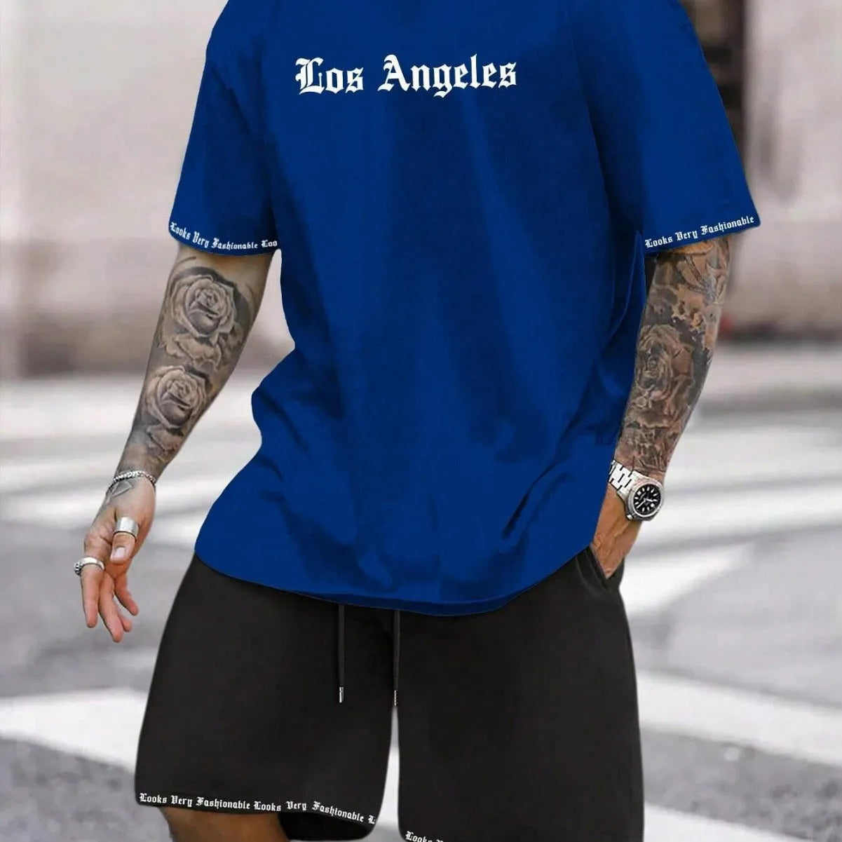 Sports style short sleeve top and shorts set in thin quick-drying fabric, shown in a printed pattern.