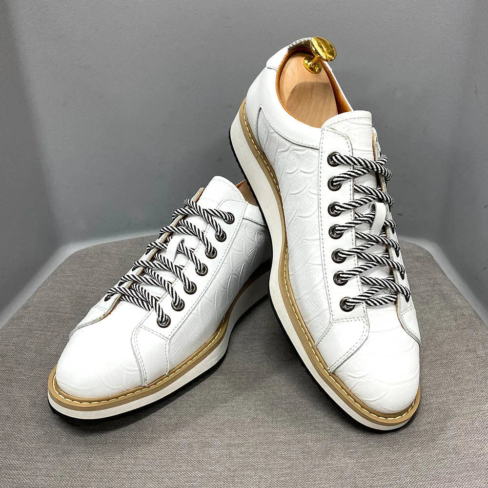 Men's black pattern-embossed handmade low-top shoes with front tie style on a white background.