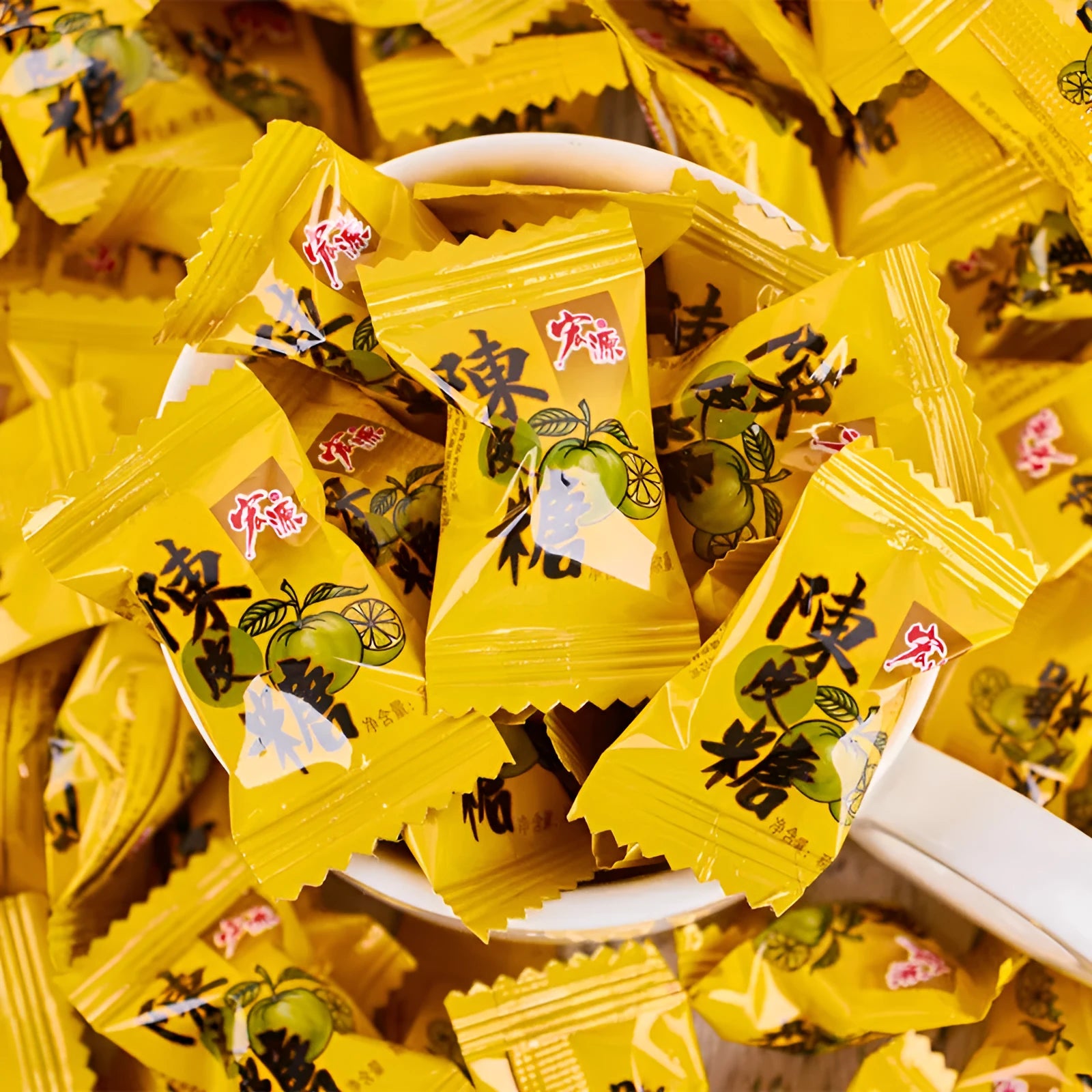 Three bags of Asian fruit hard candies: guava, plum sugar, and tangerine peel flavours