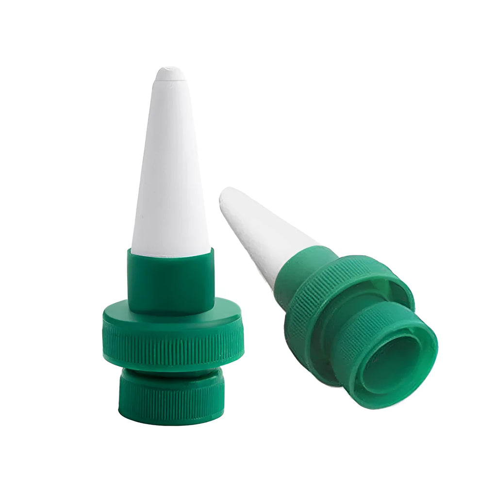 Green ceramic watering dripper for cola bottles providing automatic plant irrigation