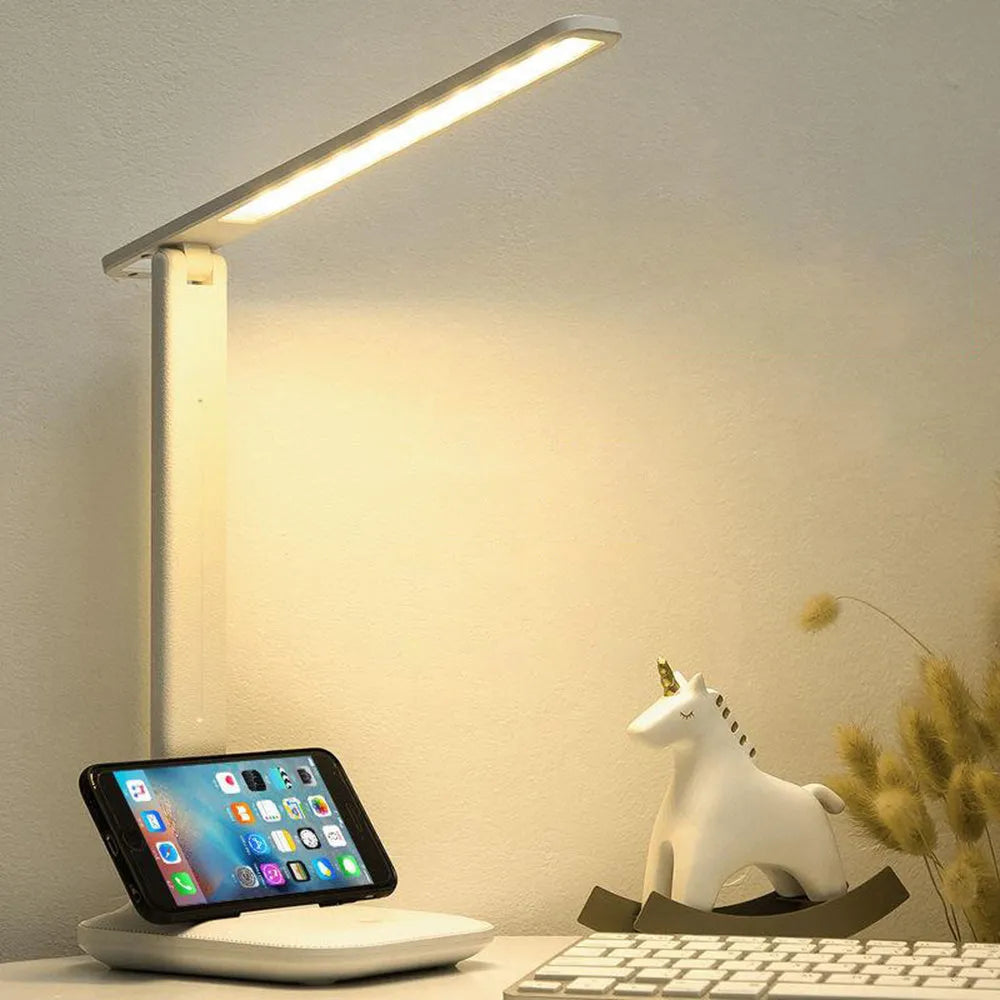 White plastic bedside lamp with touch dimming and colour-changing LED light for children's rooms