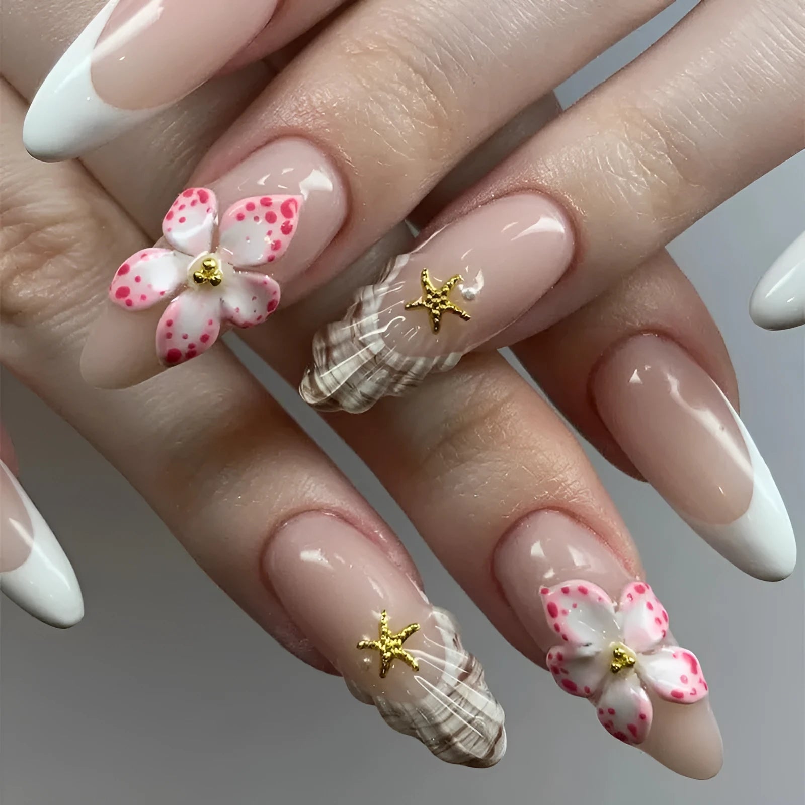 French style fake nails with a simple flower rock pattern in colour W1764, includes glue.