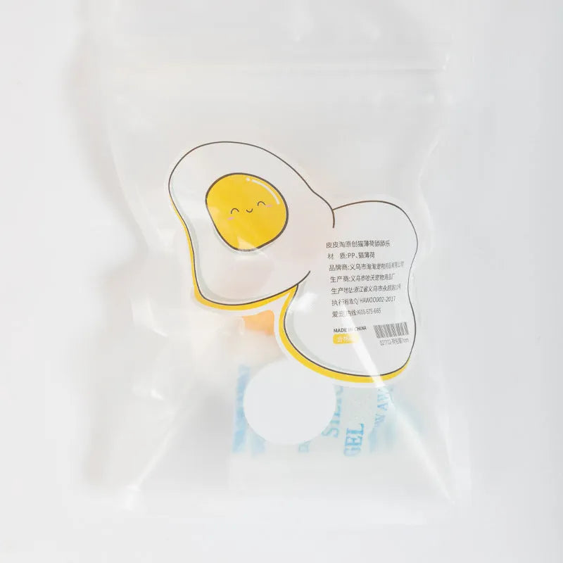 Organic catnip ball toy in egg shape with wall mounting for feline dental care and interactive play