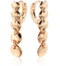 Gold tone retro earrings with a round circle shape and surface weave design, hanging as a dangle.
