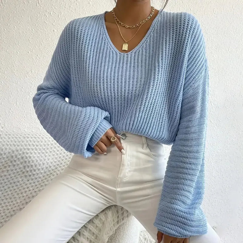 Solid colour long sleeve pullover for women in loose casual fit, shown in available colour options.