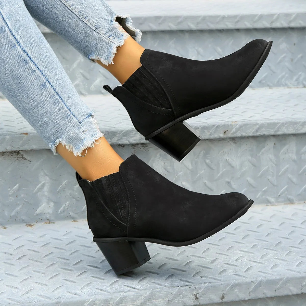 Women's black ankle boots with pointed toe and thick square heel, slip-on design for autumn winter wear