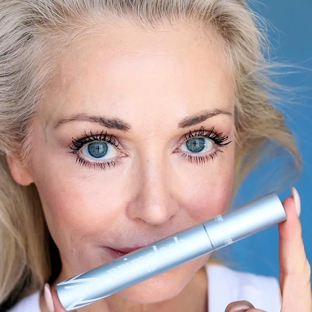 Black eyelash brush and comb beauty tool for makeup application and lash grooming