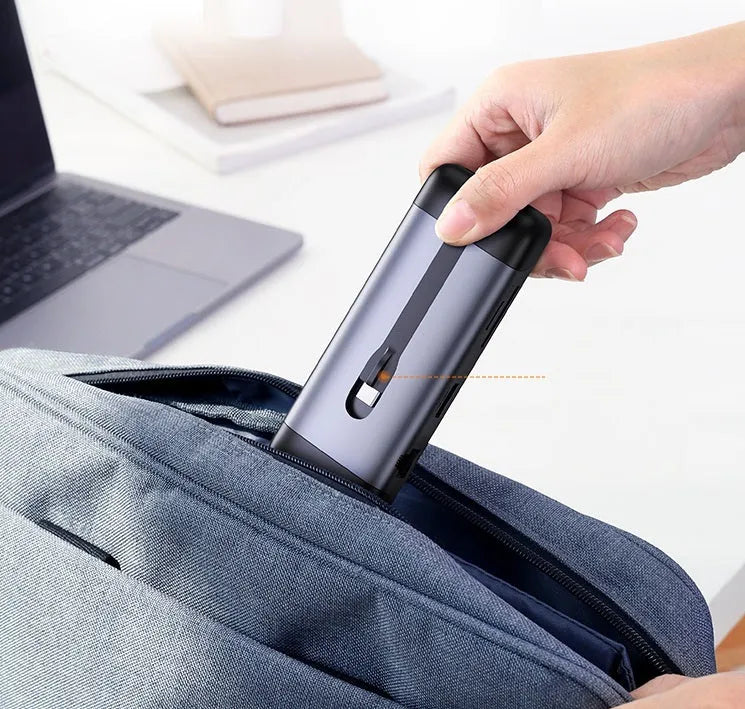 USB-C to HDMI, USB 3.0, PD charging, VGA, and Ethernet docking station adapter with short cable.