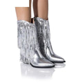 Women's black chunky heel tassel boots with a pointed toe and a high stiletto heel.