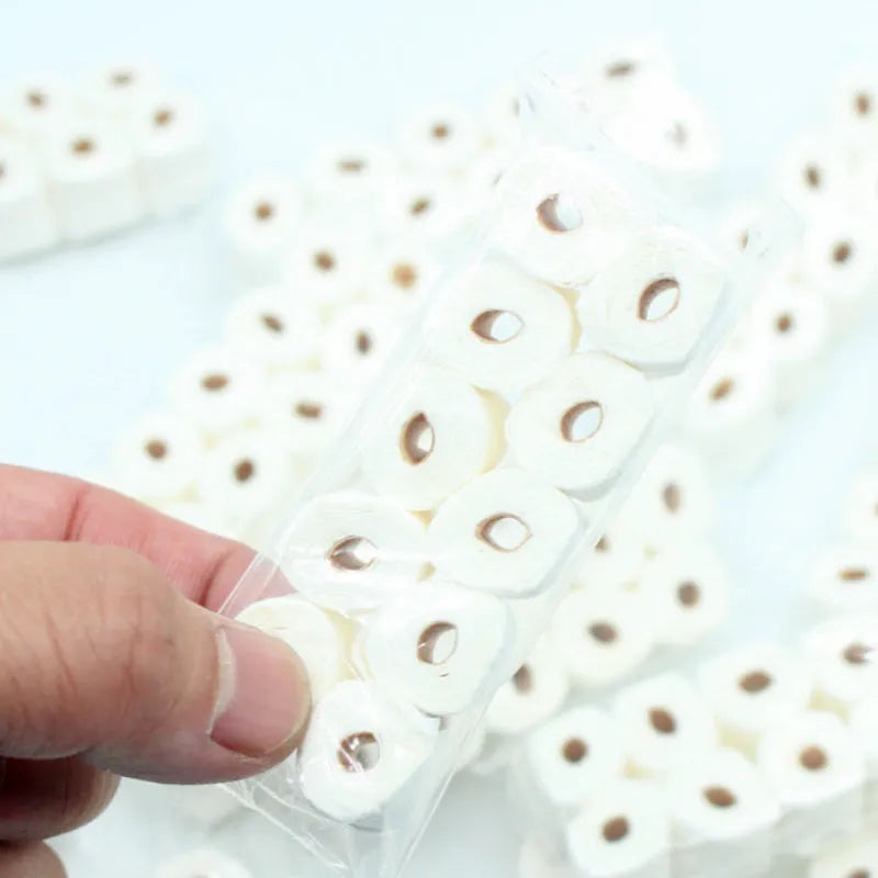 Miniature paper simulated toilet roll model for childrens toys, measuring 30mm by 15mm by 80mm.