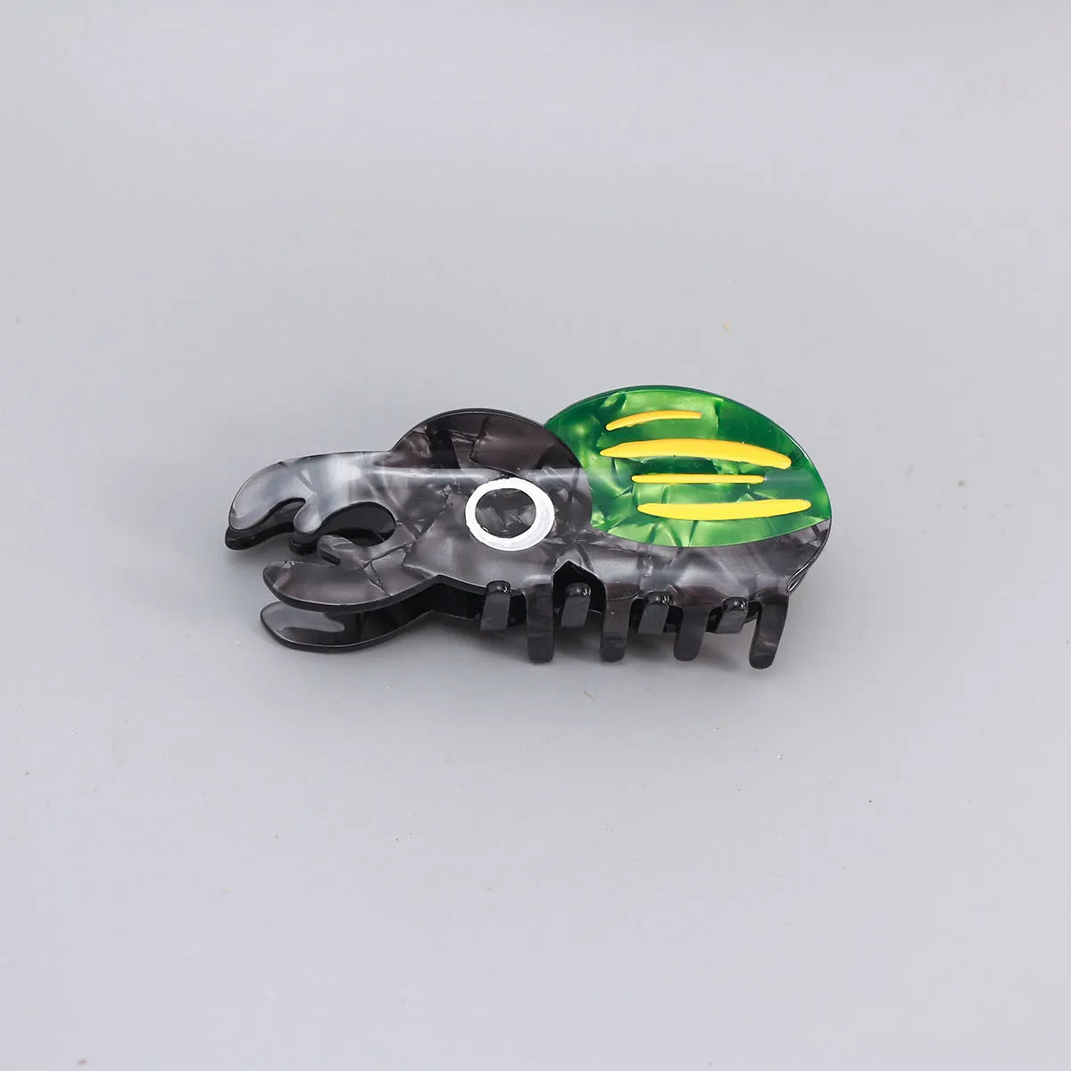 Handmade cellulose acetate Beetle Grip with cartoon caterpillar design in green or orange beetle colours