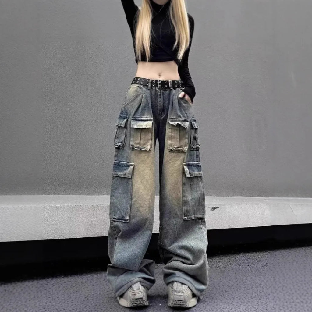 Loose straight-leg denim jeans with multiple pockets and distressed finish in light blue colour