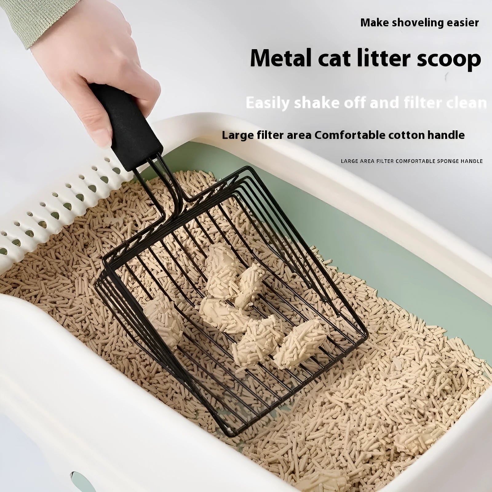 Black metal cat litter scoop with 0.8cm gap between tines for clumping litter cleaning